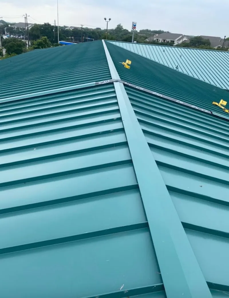 Green commercial metal roof ridge and valley for Metal Roof Repair in Coffeyville